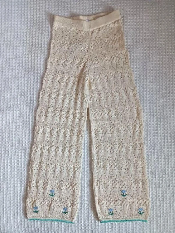 Pružné pletené široké kalhoty vel. 128, krémové s vyšívanými květinami - M&S